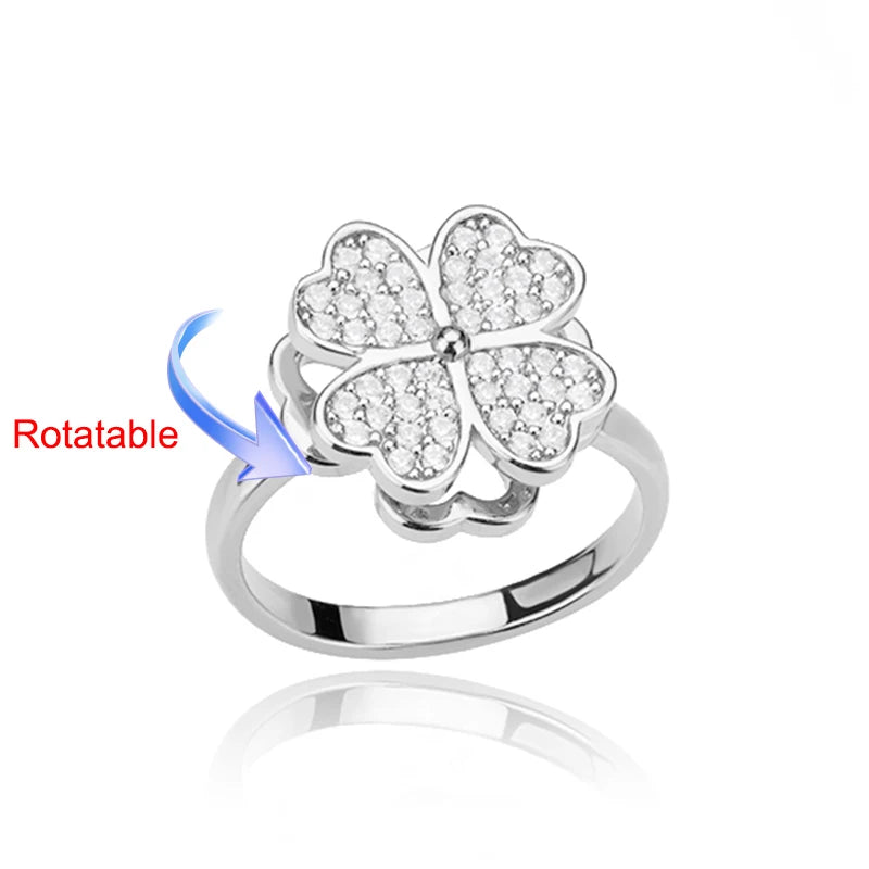 Rotating anxiety ring with clover design
