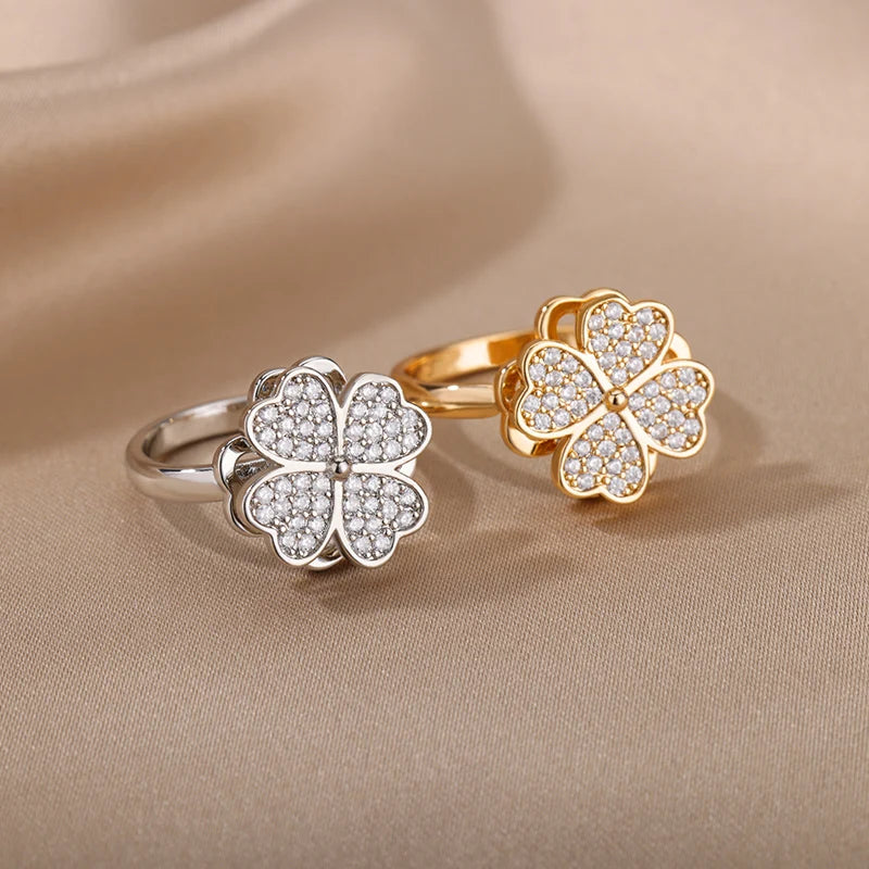 Rotating anxiety ring with clover design