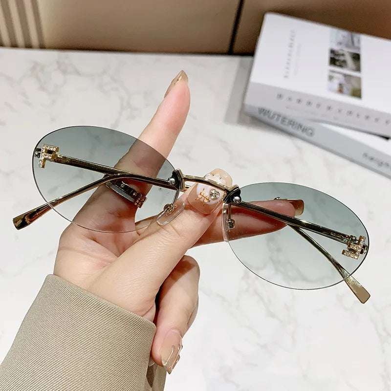 Rimless Sunglasses with 'F' Detail and Elegant Oval Style