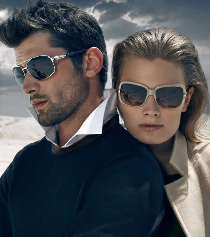 A stylish couple modeling Eclat Eyewear sunglasses, showcasing bold fashion eyewear for confident individuals.