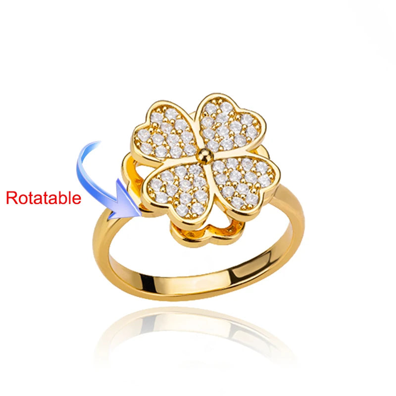 Rotating anxiety ring with clover design