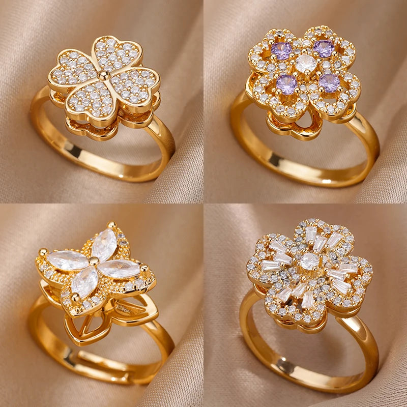 Rotating anxiety ring with clover design
