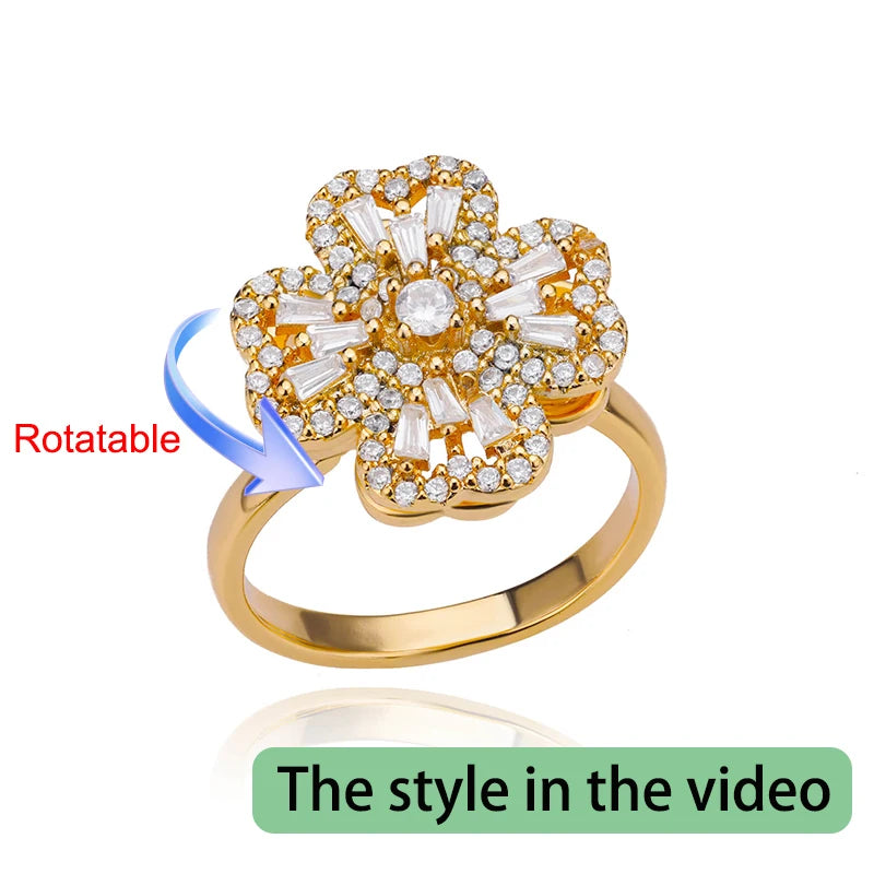 Rotating anxiety ring with clover design