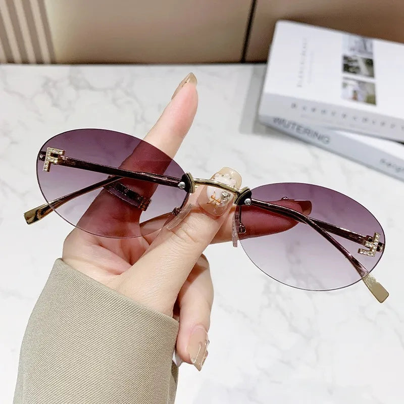 Rimless Sunglasses with 'F' Detail and Elegant Oval Style