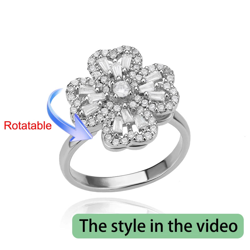 Rotating anxiety ring with clover design