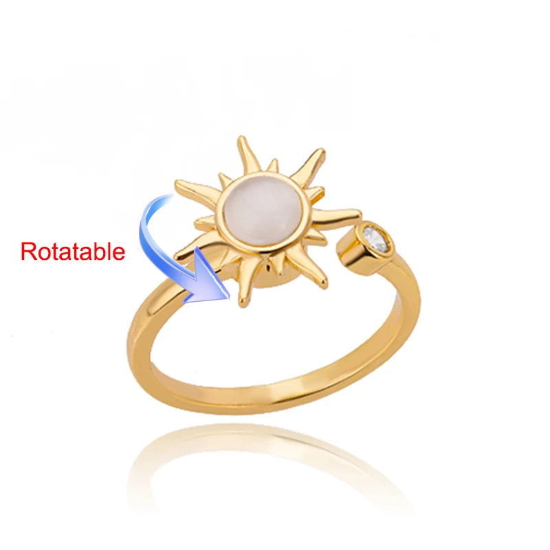 Rotating anxiety ring with clover design