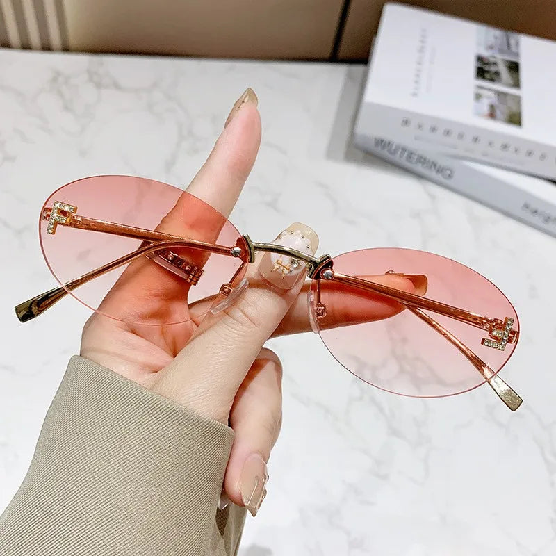 Rimless Sunglasses with 'F' Detail and Elegant Oval Style