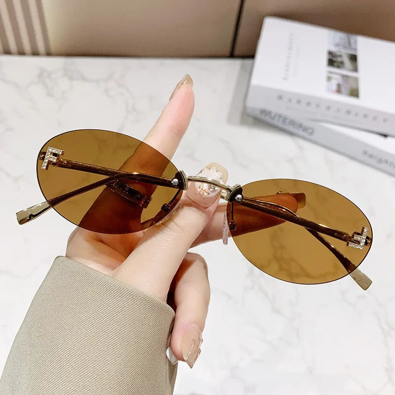 Rimless Sunglasses with 'F' Detail and Elegant Oval Style