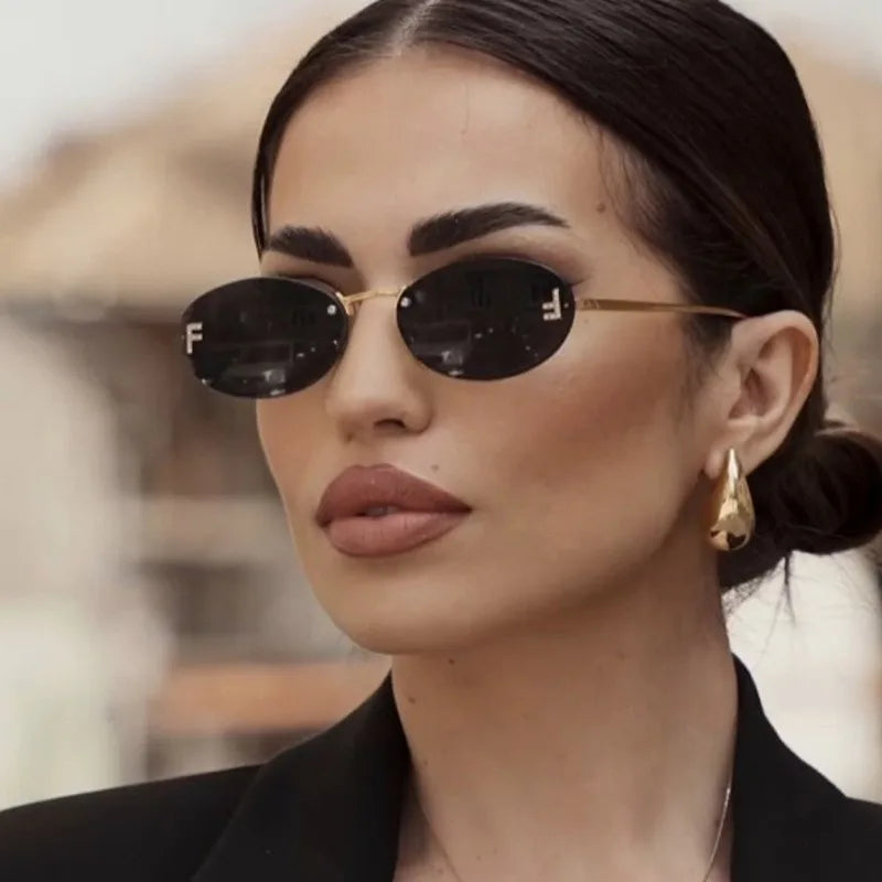 Rimless Sunglasses with 'F' Detail and Elegant Oval Style